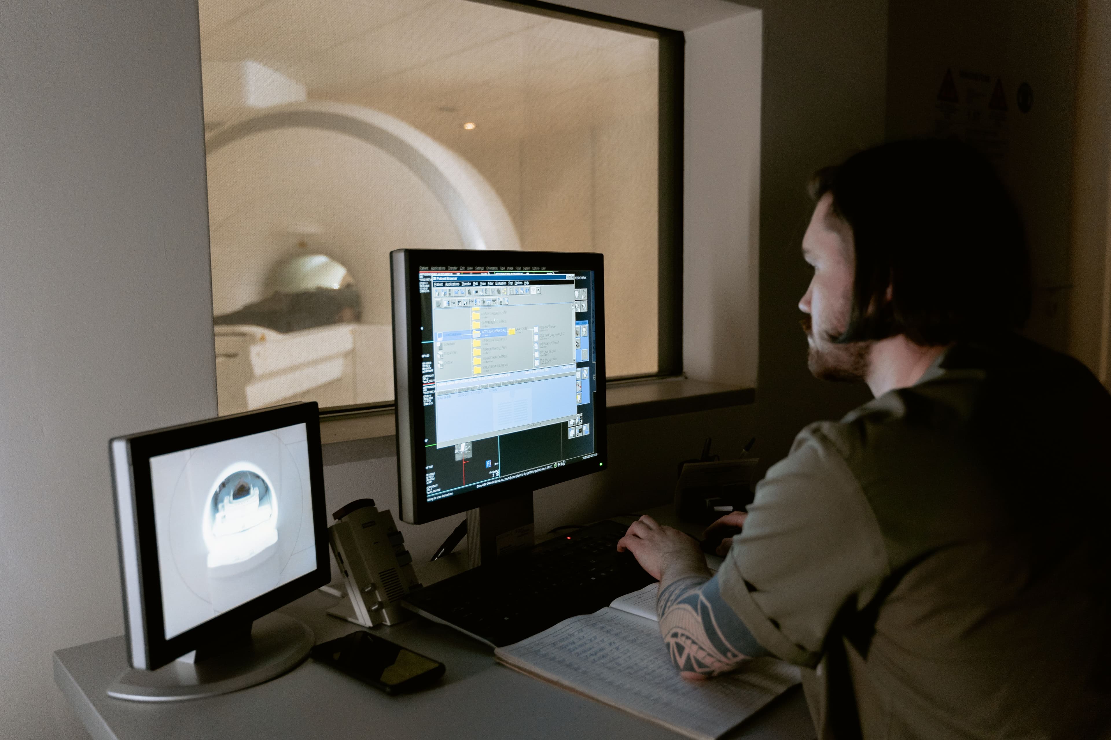 Radiologist reviewing images on a computer screen